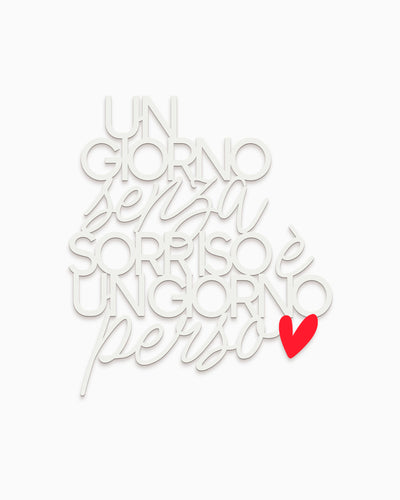 Scritta Un giorno senza un sorriso è un giorno perso