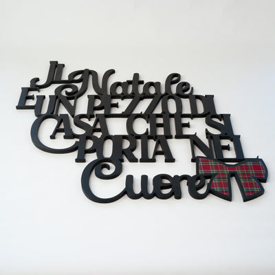 Scritta in Legno il Natale è un pezzo di casa