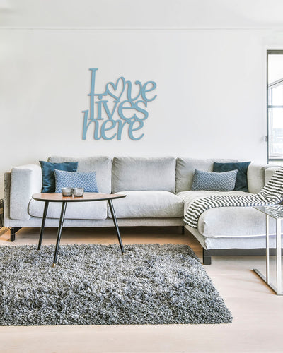 Scritta in Legno Love lives here