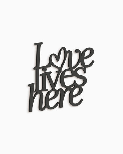 Scritta in Legno Love lives here