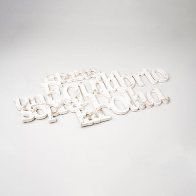 Scritta in Legno Un equilibrio sopra la follia