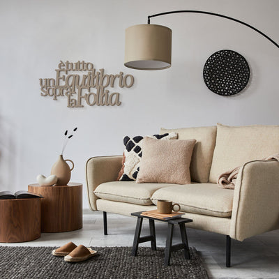 Scritta in Legno Un equilibrio sopra la follia