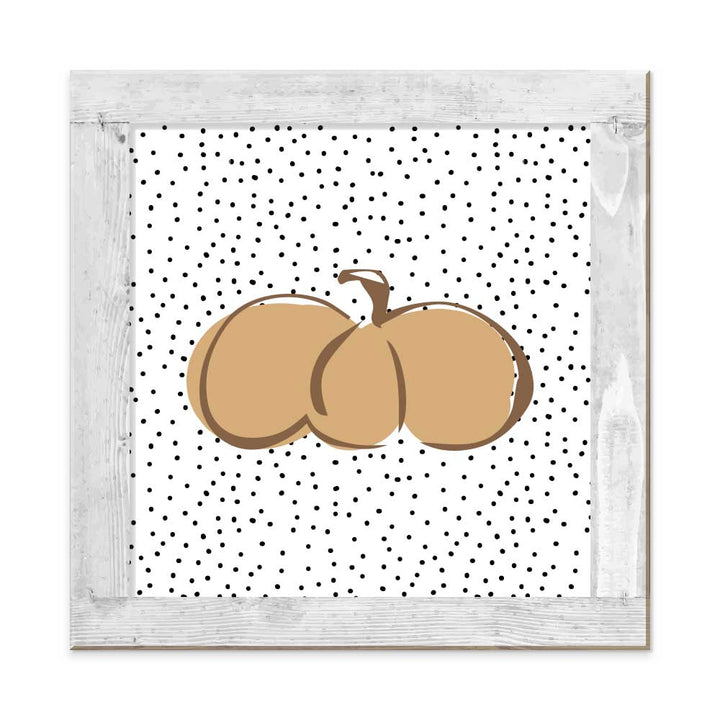 Pumpkin tablet with polka dot background
