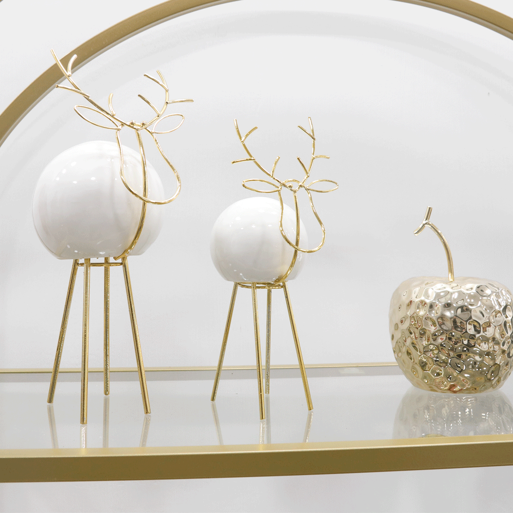 Modern reindeer in metal and ceramic