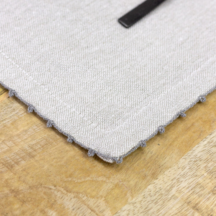 "Hence" cotton placemat with embroidered edges