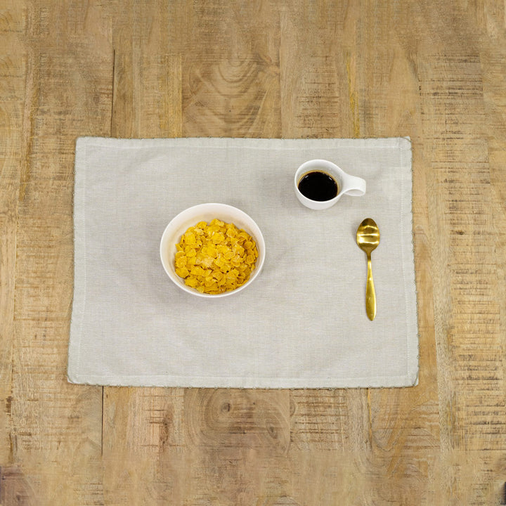 "Hence" cotton placemat with embroidered edges