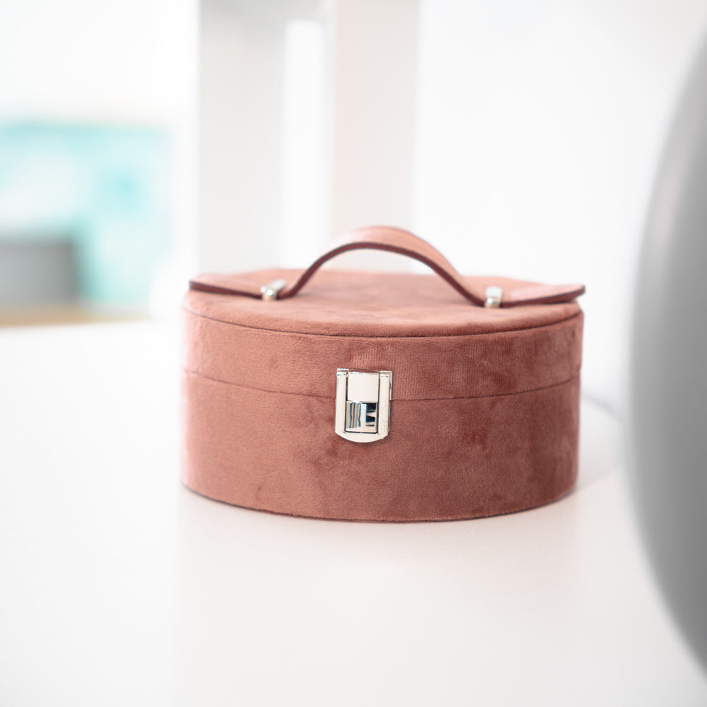 Pink velvet round jewelery box