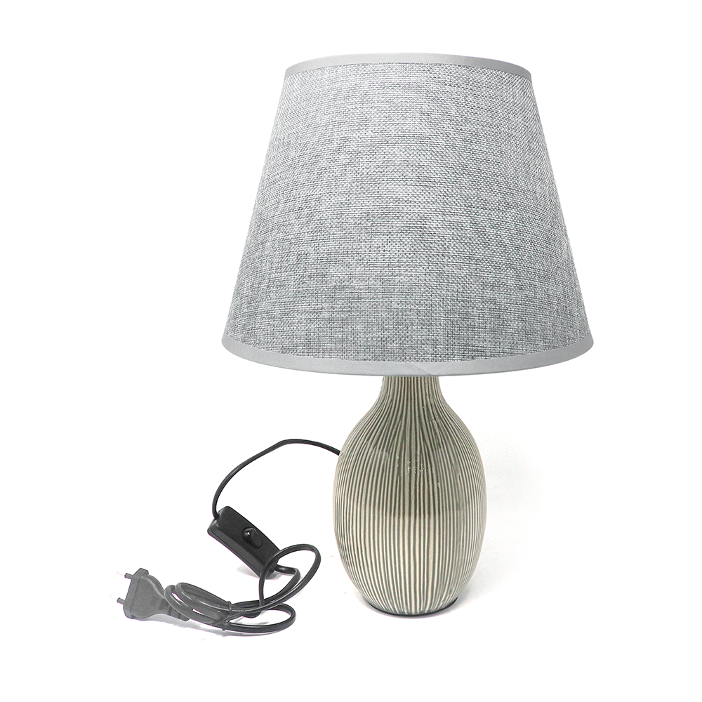 Clare lamp with ceramic base and fabric lampshade