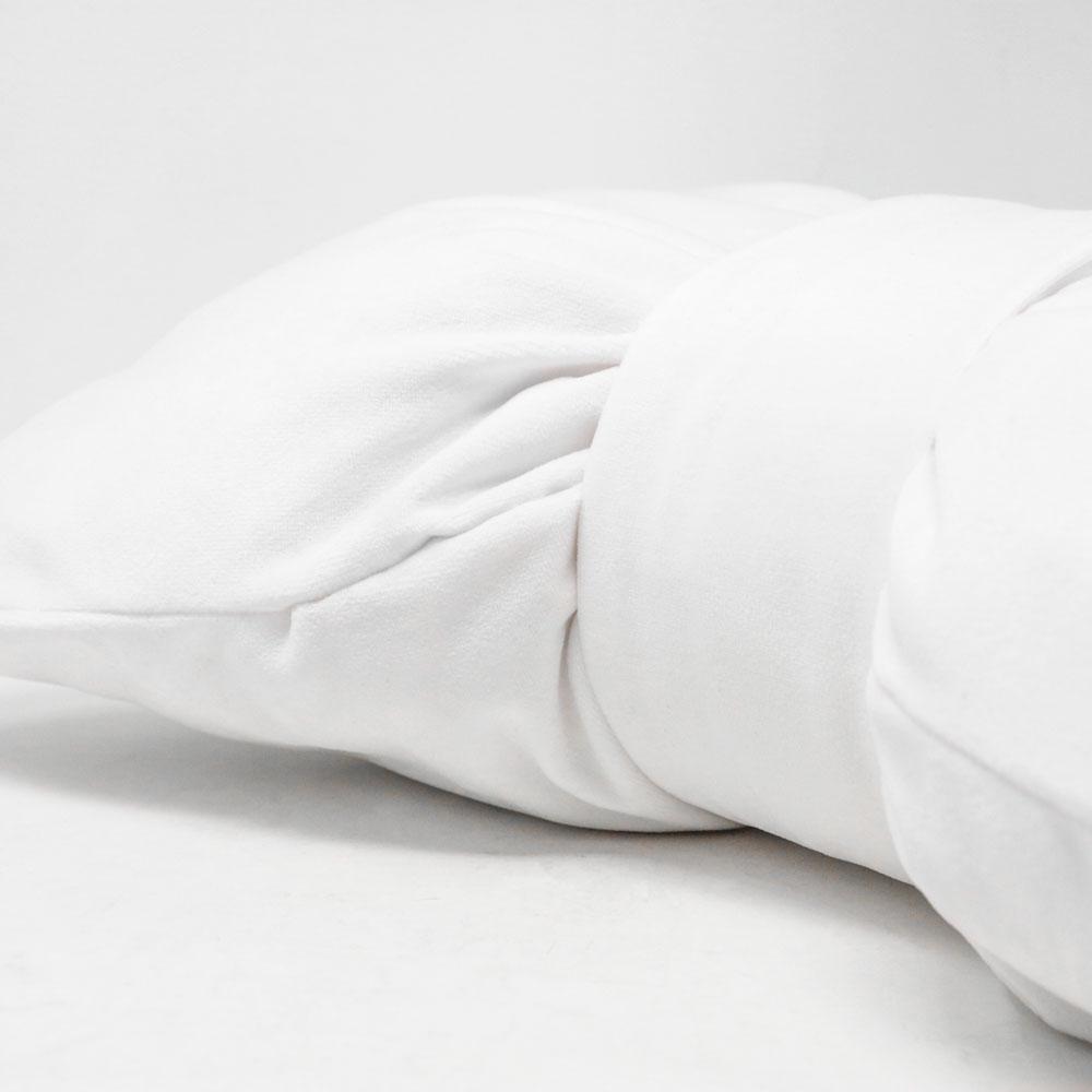 Bow cushion in white velvet