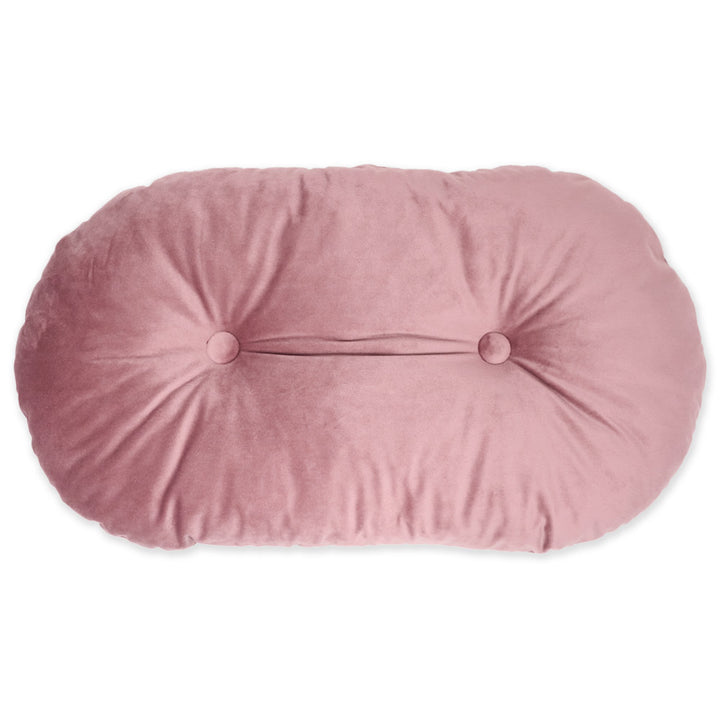 Oval cushion in antique pink velvet